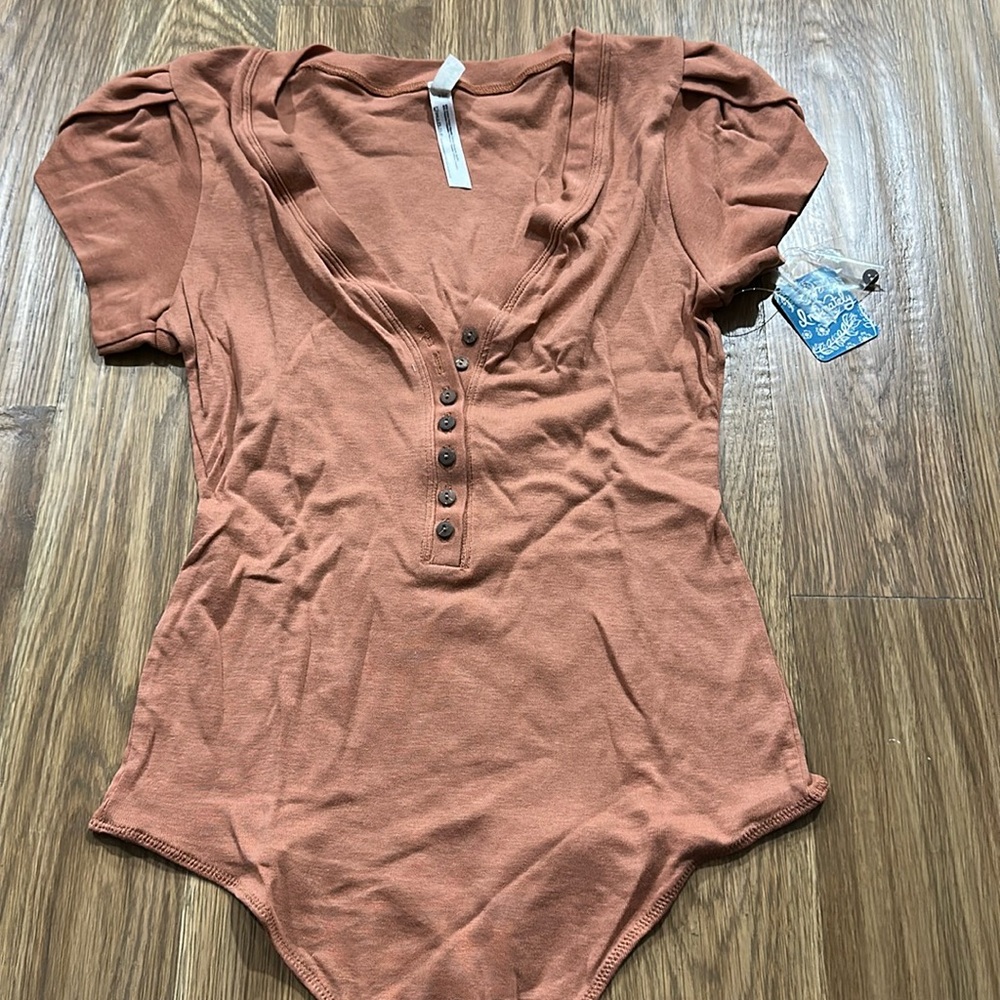 Brand new Free People bodysuit